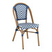 A navy and white chevron weave rattan chair.