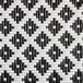 A close up of a Lancaster Table & Seating black and white birdseye weave rattan outdoor arm barstool.