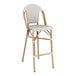 A Lancaster Table & Seating gray Teslin outdoor restaurant barstool with wooden legs and a white cushion.