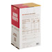 A white TCHO chocolate box with red and yellow text and numbers.