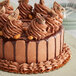A chocolate cake with TCHO Sweet & Sassy 66% dark chocolate hexagons on top.
