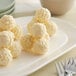 A plate of TCHO Choco Blanco white hexagons.