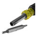 A close-up of a Klein Tools screwdriver with a yellow handle and a black screw.