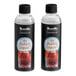 Two Breville bottles of bubble liquid with white labels.