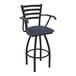 A black Holland Bar Stool with arms and a blue Graph Anchor fabric cushion.