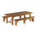 A Lancaster Table & Seating wooden table with two folding benches.