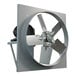 A white metal Canarm belt drive wall fan for exhaust.