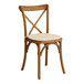 A Lancaster Table & Seating Vineyard Series wooden outdoor chair with a tan cushion.