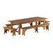 A Lancaster Table & Seating wooden picnic table with benches.