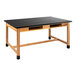 A wood National Public Seating science lab table with a black Chem-Res top.