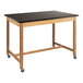 A black rectangular National Public Seating science lab table with wheels.