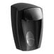 A black plastic Kutol EZ Foam hand soap dispenser with a push button.