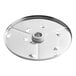 An AvaMix circular metal grating / shredding disc with holes.