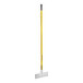 A white object with a yellow handle.
