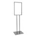 A metal sign holder with a blank sign on it.