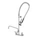 A deck mount Eversteel pre-rinse faucet with a 14" swing nozzle and a hose.