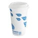 A white EcoChoice paper hot cup with blue leaf print.