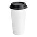 A white Choice paper hot cup with a black lid.