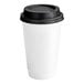 A white Choice paper hot cup with a black lid.