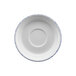 A white porcelain saucer with a blue and white circle design.