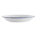 A white porcelain saucer with a blue rim.