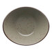 An International Tableware oval stoneware bowl with speckled green smoke finish.