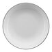 A white porcelain serving bowl with a black band around the rim.