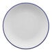 A white porcelain bread and butter plate with a blue rim.