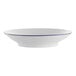 A white porcelain bowl with a blue rim.