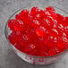 A bowl of Albanese Berry Red gummi raspberries.