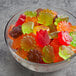 A bowl of Albanese Gummi Awesome Blossoms on a counter.