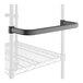 A black metal shelf with a black U-shaped handle.