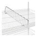 A chrome wire shelf divider on a wire rack shelf.