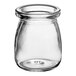 An American Metalcraft clear glass jar with a round top and lid.