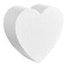 A close up of a white Baker's Lane foam heart cake dummy.