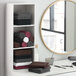 Monarch Brands black microfiber hand towels on a shelf in a room with a mirror.