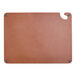 A brown plastic Choice cutting board with ruler grips.