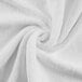 A white Monarch Brands hand towel with a spiral pattern.
