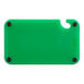 A green plastic Choice cutting board with black grips.