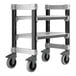 A white Cambro Camshelving Elements undercounter cart with black wheels.