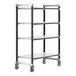 A black metal Cambro Camshelving unit with white solid shelves and wheels.