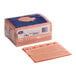 A pack of red Tork odor-resistant food service wipers.