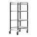 A Cambro Elements XTRA metal shelving unit with wheels.