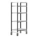 A black metal Cambro Camshelving unit with four vented shelves on wheels.