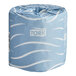 A Tork Advanced individually wrapped toilet paper roll.