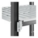 A close-up of a white plastic Cambro Camshelving shelf.