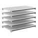A set of five vented plastic shelving panels designed for modular storage systems.