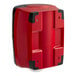 A red and black plastic Tork Maxi center pull wiper dispenser.