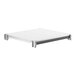A white Cambro Elements XTRA solid shelf with black legs.