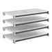 A set of four Cambro Camshelving Elements XTRA shelves, each measuring 18 by 36 inches, with three vented shelves and one solid shelf.